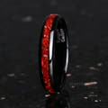Women's 4mm black tungsten band with crushed ruby inlay, standing upright