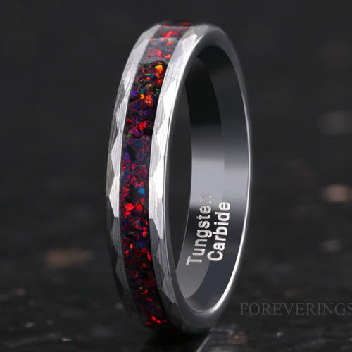 4mm hammered silver tungsten ring with crushed black fire opal inlay, standing at an angle