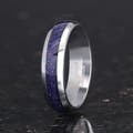 Men's 6mm silver tungsten band with blue sandstone inlay, angled to show the interior