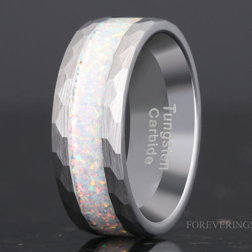 Men's 8mm hammered silver tungsten ring with white fire opal inlay, standing at an angle