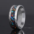 Men's 8mm hammered silver tungsten band with meteorite and galaxy opal inlay, standing at an angle