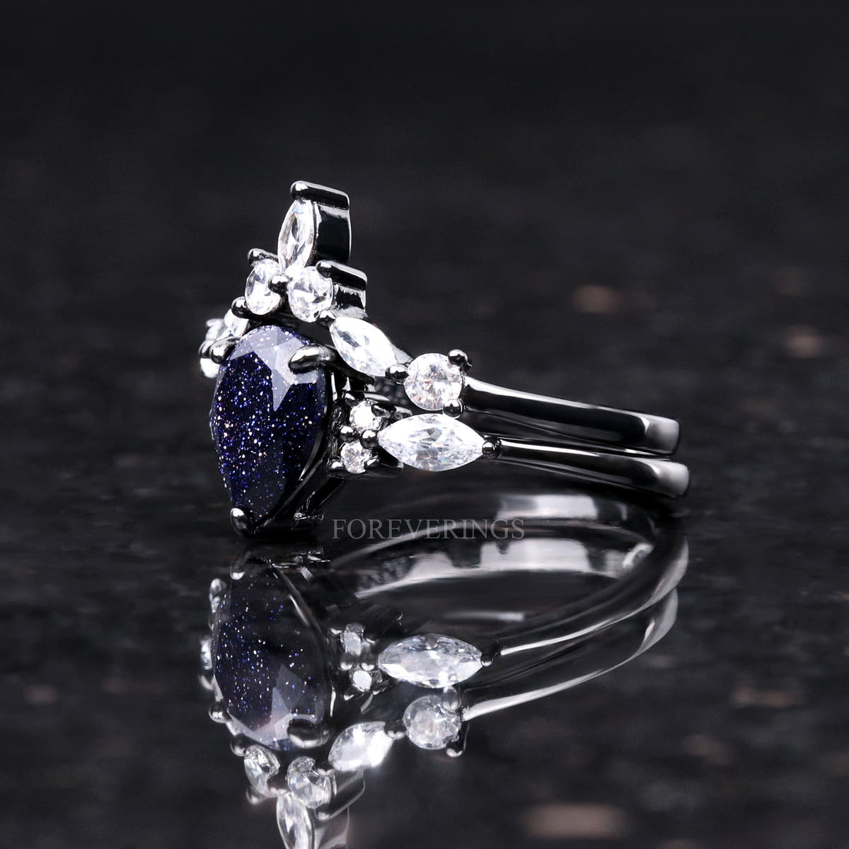 Blue sandstone bridal set in black sterling silver, angled side view