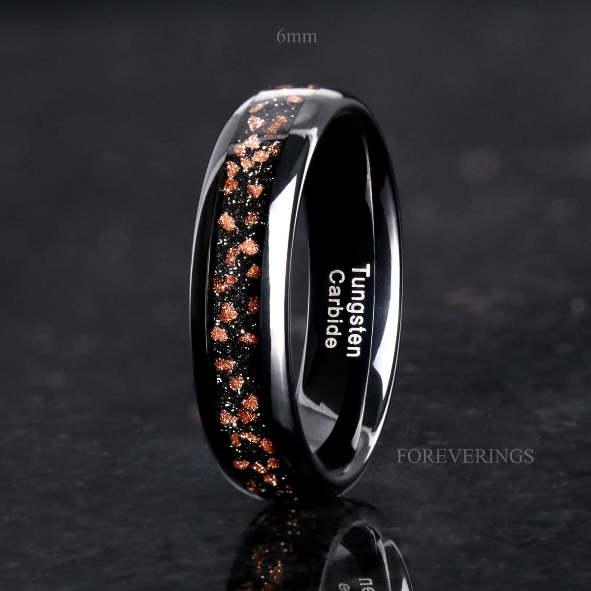 6mm black tungsten ring with red goldstone inlay standing upright, labeled 6mm
