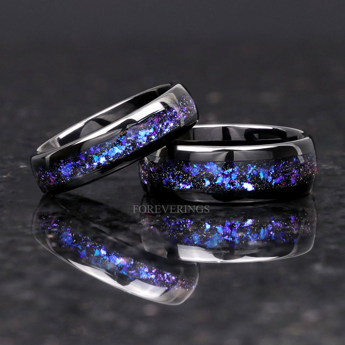 Two black tungsten nebula bands in different widths, the narrower one leaning on the wider