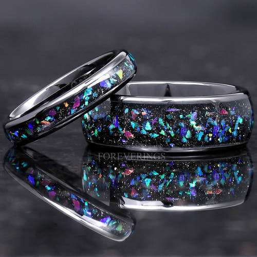 Matching black ceramic couples ring set with galaxy opal inlay, 8mm and 4mm