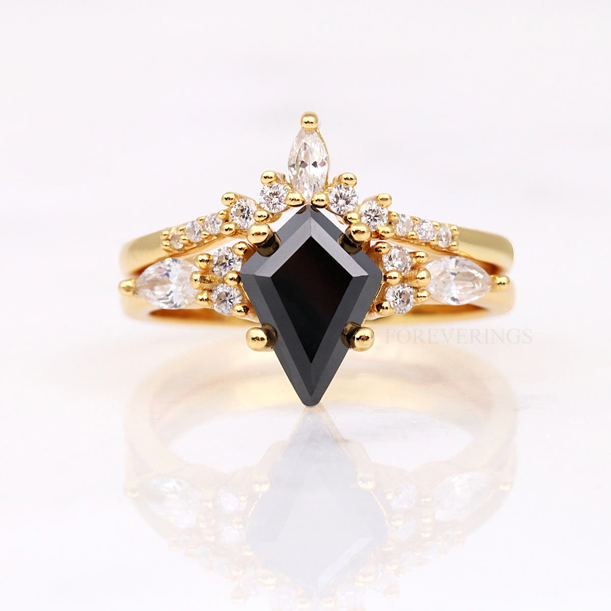 Women's gold sterling silver kite black onyx engagement ring set, shown straight on