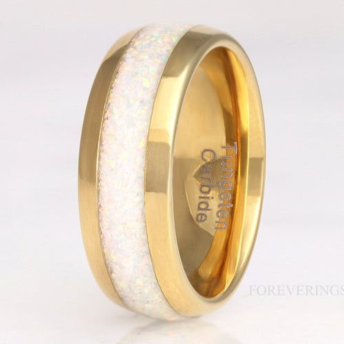 Men's 8mm gold tungsten ring with white fire opal inlay, angled close-up