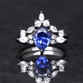 Women's pear blue sapphire ring in black sterling silver, shown straight on