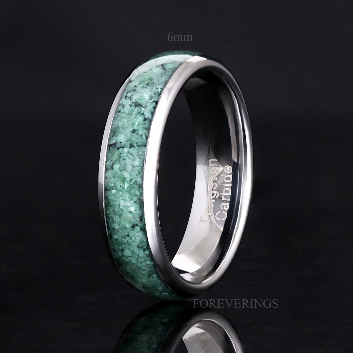 6mm silver tungsten ring with green moss agate inlay standing on edge, angled view