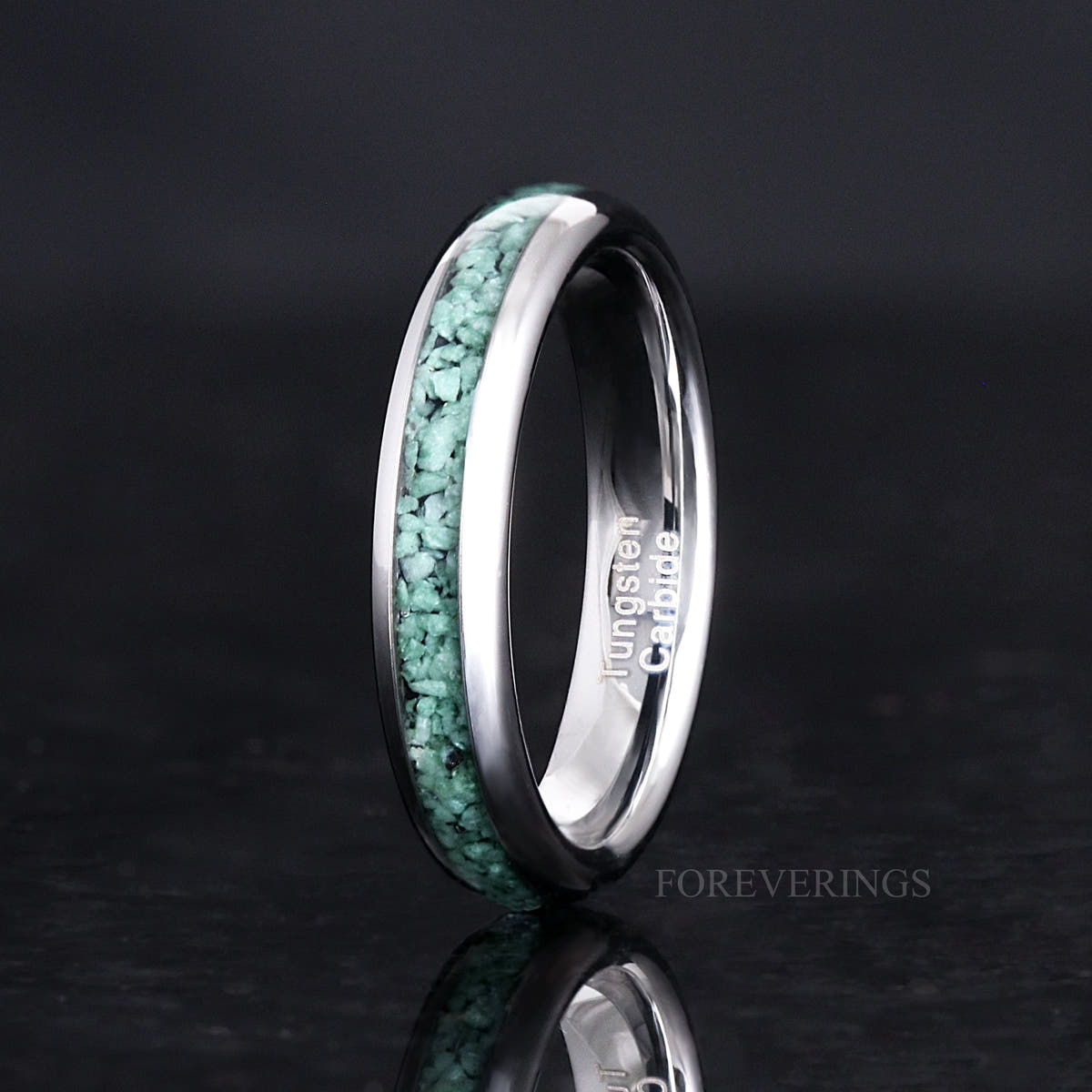 Women's 4mm silver tungsten moss agate ring angled to show the interior