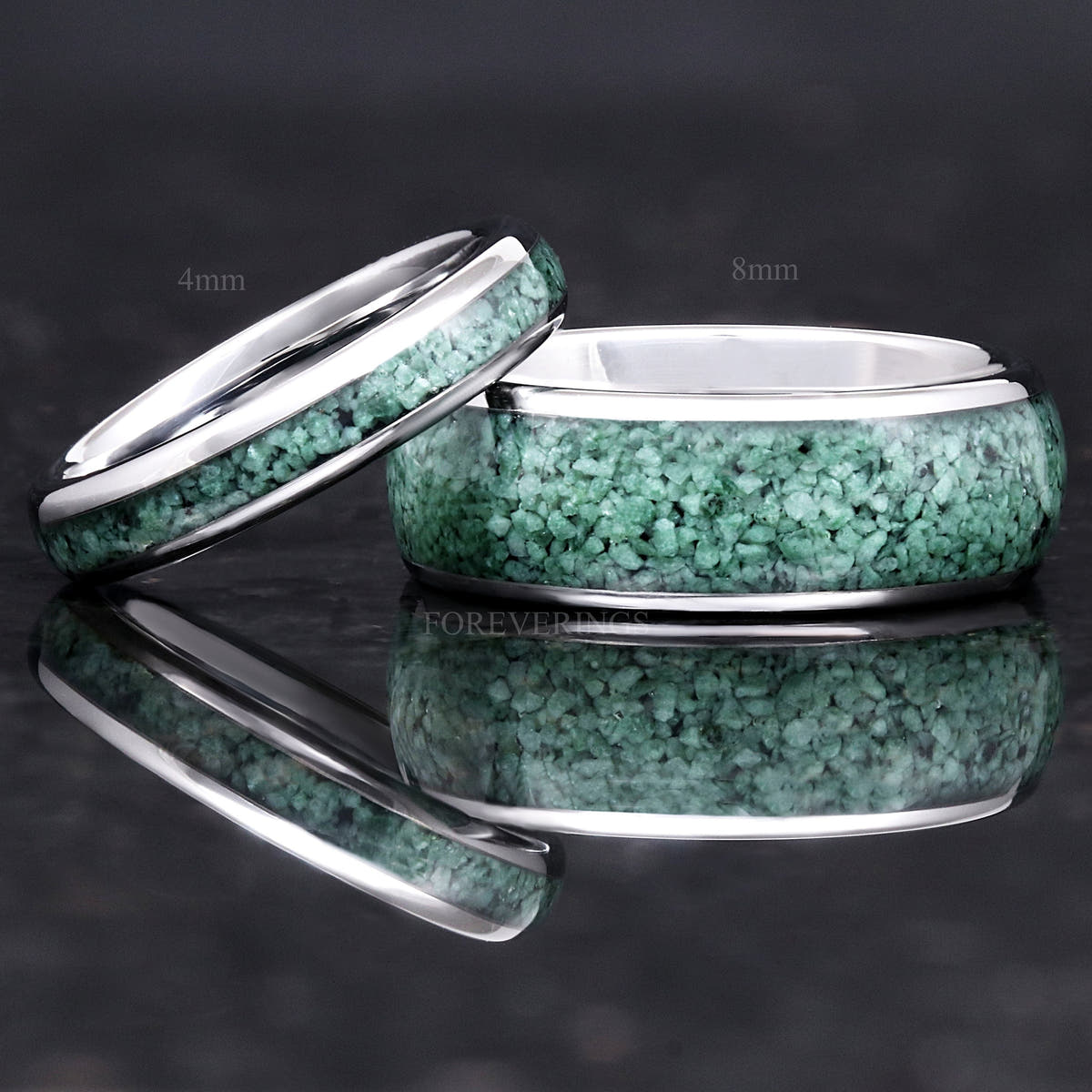 4mm silver moss agate ring leaning on an 8mm band with the same inlay, both labeled