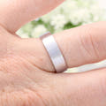 6mm matte sterling silver band, close-up on a finger