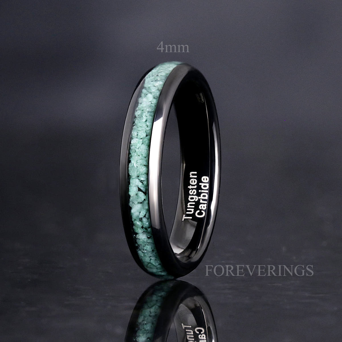 Black tungsten moss agate ring labeled 4mm, standing on edge