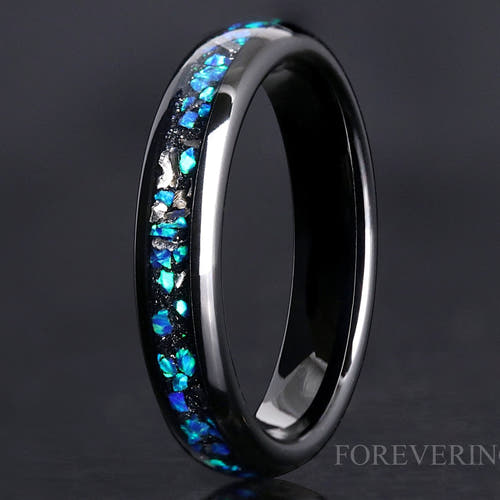 4mm black tungsten band with meteorite and blue opal inlay, standing at an angle