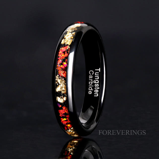 4mm black tungsten wedding ring standing upright, red fire opal and gold leaf inlay, polished