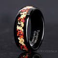 Men's 8mm polished black tungsten ring with red fire opal and gold leaf inlay, standing on edge