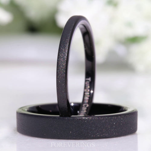 2mm black sandblasted tungsten band standing on a 4mm band lying flat