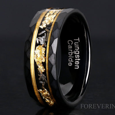 Men's 8mm hammered black tungsten band with meteorite and gold leaf inlay, gold accent edges