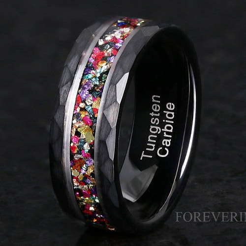 Men's 8mm hammered black and silver tungsten ring with crushed amethyst, ruby, citrine and emerald inlay, angled