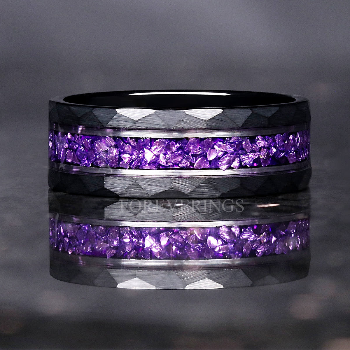 8mm hammered black tungsten ring with crushed amethyst inlay shown straight on, reflection below