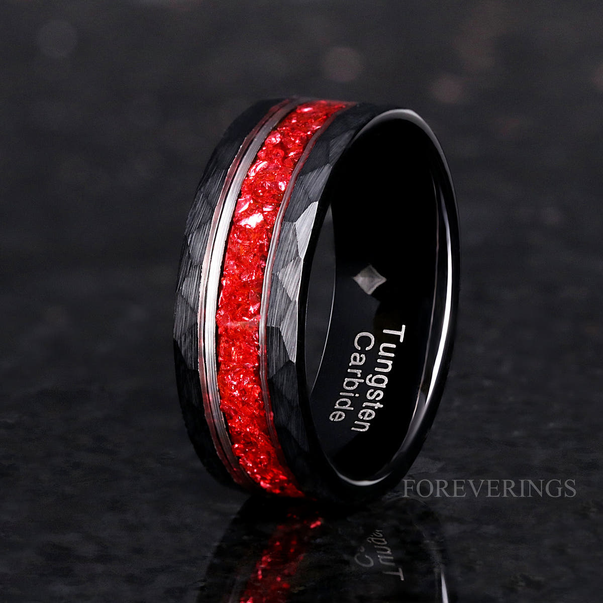 8mm matte black hammered tungsten ring with ruby inlay, standing at an angle