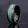 Matching black nature-inspired couples rings with moss agate