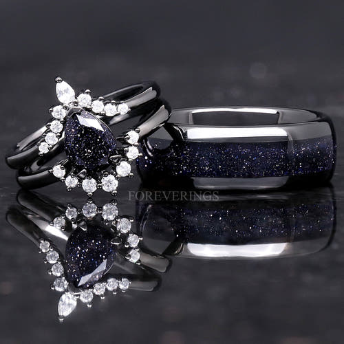 Matching black couples ring set with a pear blue sandstone engagement ring and 8mm tungsten band