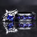 Matching black couples ring set: kite-cut sapphire engagement ring and 8mm Orion nebula tungsten band