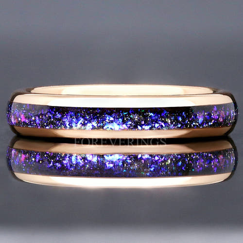 4mm rose gold tungsten ring with Orion nebula sandstone inlay, shown straight on with a reflection below