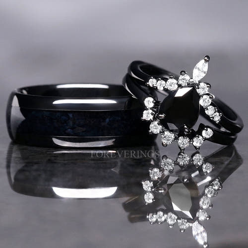 Matching black couples ring set with a pear black onyx engagement ring and 8mm tungsten band