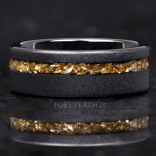 Men's 8mm sandblasted black tungsten band with crushed citrine inlay, close front view