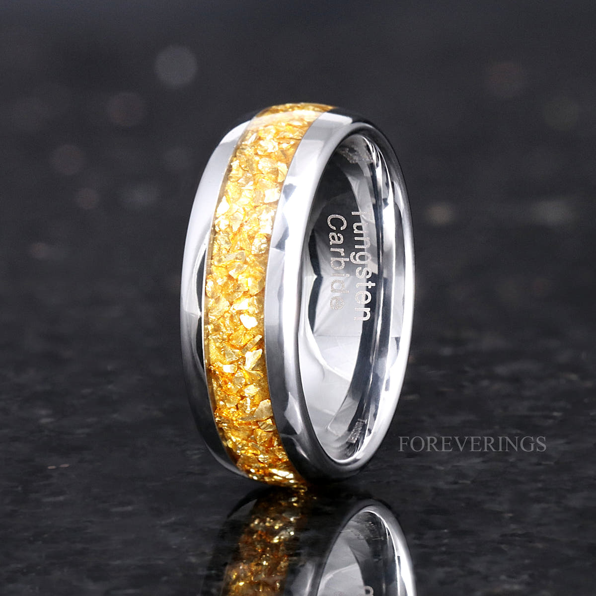 Men's 8mm silver tungsten wedding band with crushed citrine inlay, standing angled