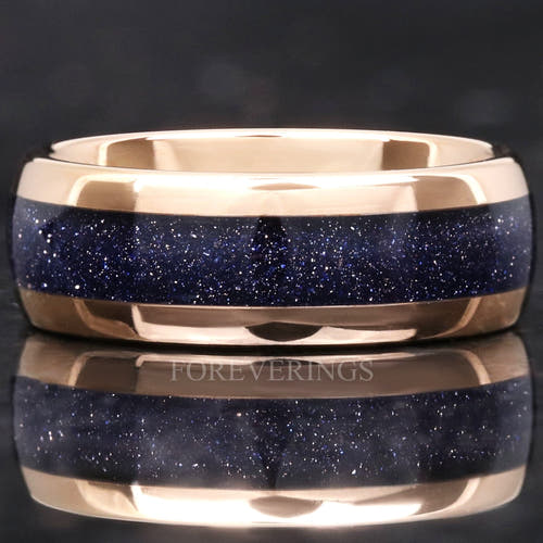 Rose gold tungsten wedding band with blue sandstone Great Rift nebula inlay, polished dome finish