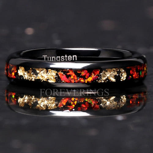 4mm black tungsten ring with crushed red fire opal and gold leaf inlay, straight on with reflection