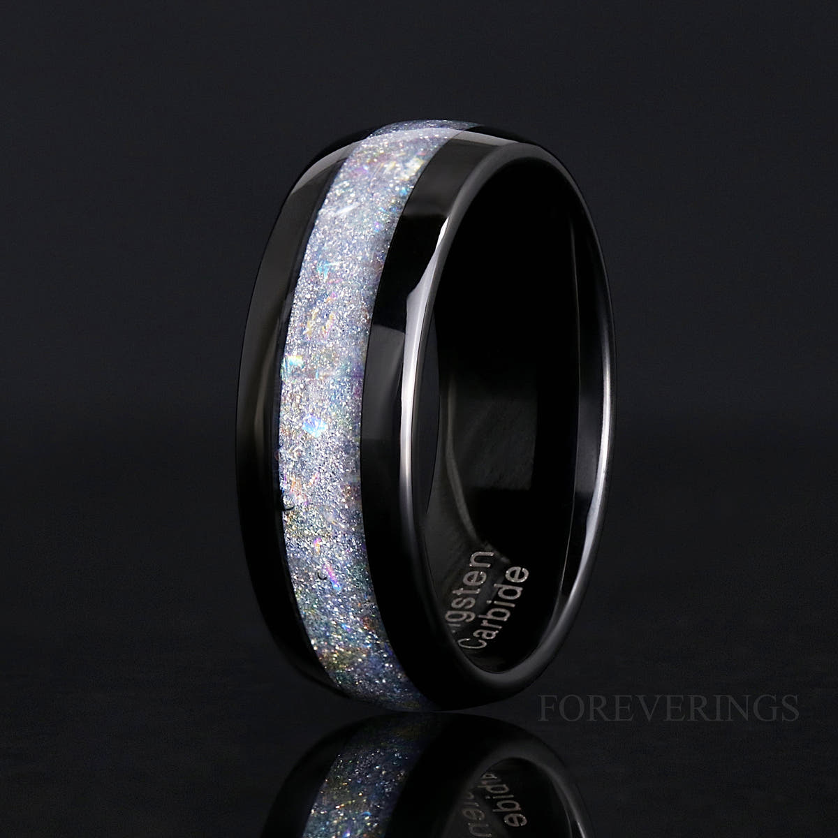 8mm black tungsten moonstone band standing, angled to show the inside