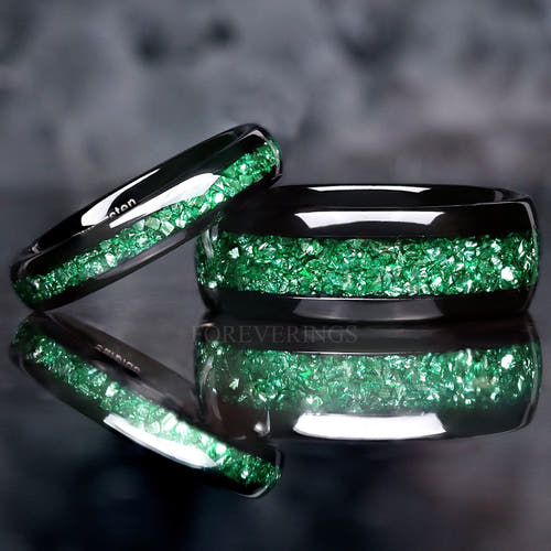 Matching black tungsten couples ring set with crushed emerald inlay, 8mm and 4mm