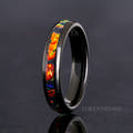 Women's 4mm black tungsten ring with dichrolam inlay, standing upright