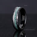 Men's black tungsten ring labeled 6mm with crushed moss agate stripe, standing angled