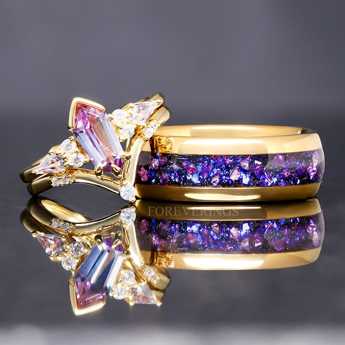 Alexandrite bridal set leaning on a wider gold band with a purple crushed inlay