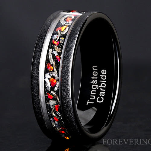 Men's 8mm black tungsten wedding band with meteorite, red fire opal and glowstone inlay