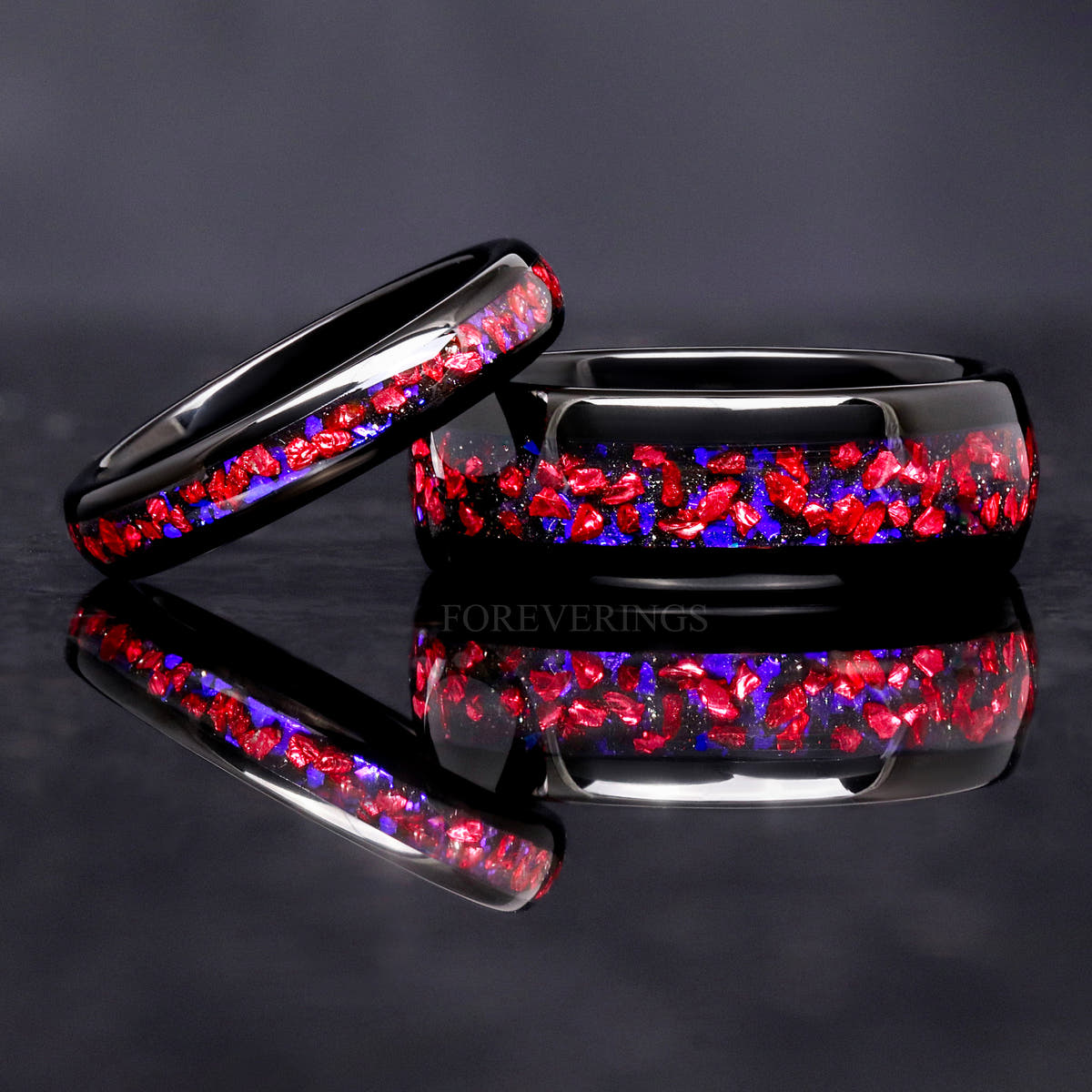 8mm black tungsten inlay band with a thinner ring of the same design leaning against it