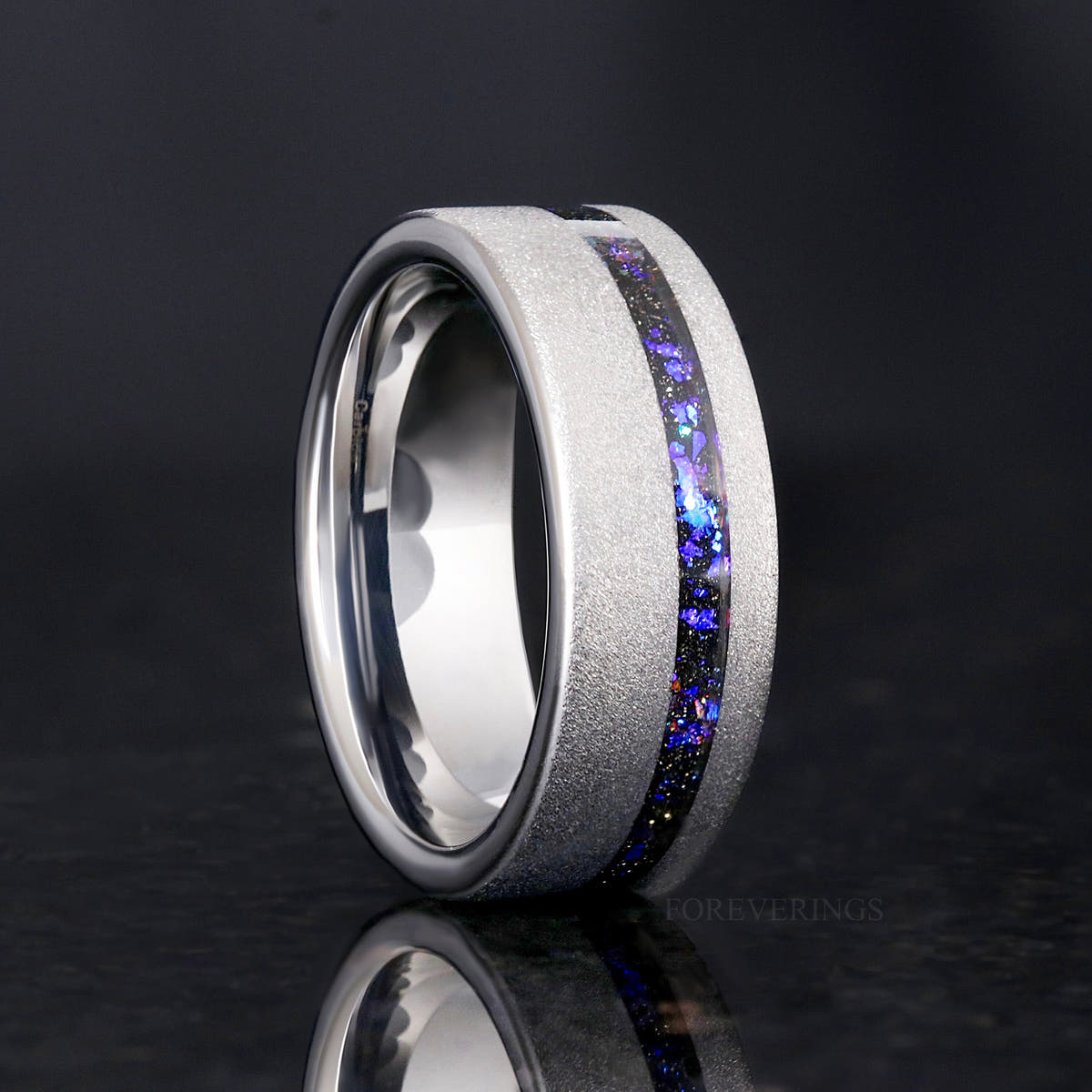 Men's 8mm sandblasted silver tungsten band with an offset nebula sandstone strip, standing