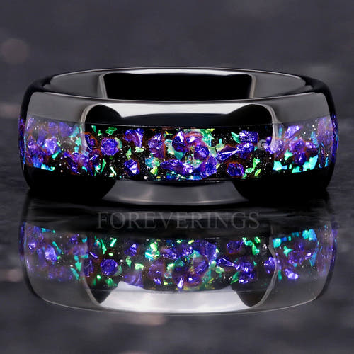 Men's 8mm black tungsten band with purple and green ghost nebula inlay, straight-on close-up