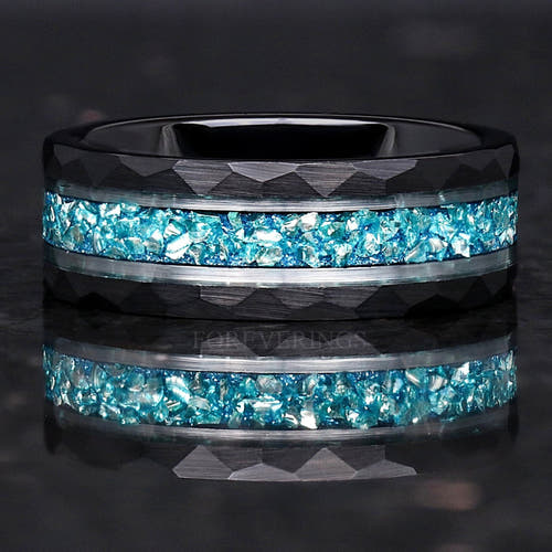 Men's 8mm hammered black tungsten band with crushed aquamarine inlay, shown straight on