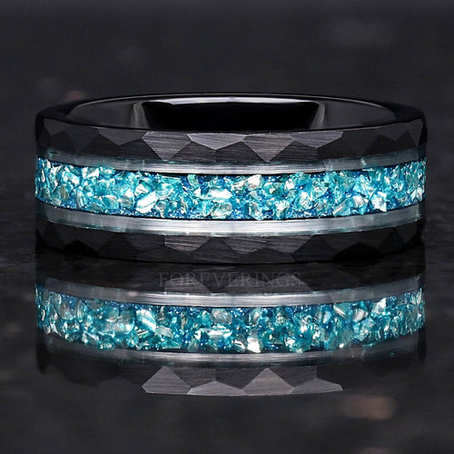 Men's 8mm hammered black tungsten band with crushed aquamarine inlay, shown straight on