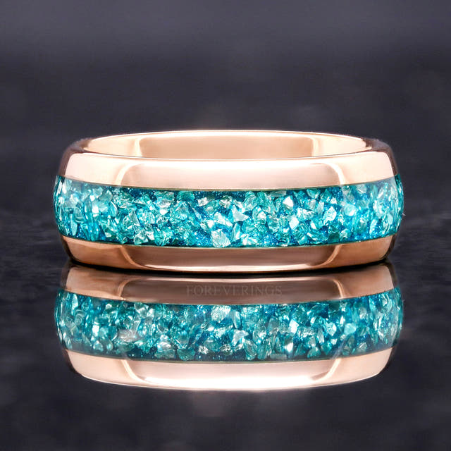 Rose gold tungsten aquamarine band shown straight on with reflection below