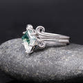 Sterling silver moss agate engagement ring and swirl band, angled side view