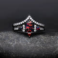 Women's black sterling silver shield-cut fire opal engagement ring and curved band, straight on