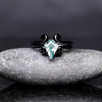 Women's 1.7mm black sterling silver moss agate ring, kite cut stone shown straight on