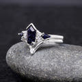 Blue sandstone engagement ring and chevron band angled to show the side profile